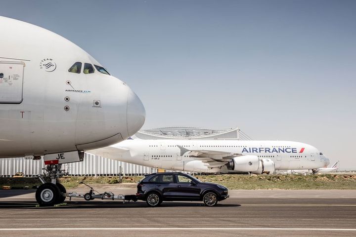 Cayenne earns a Guinness World Record for towing the world’s heaviest plane image