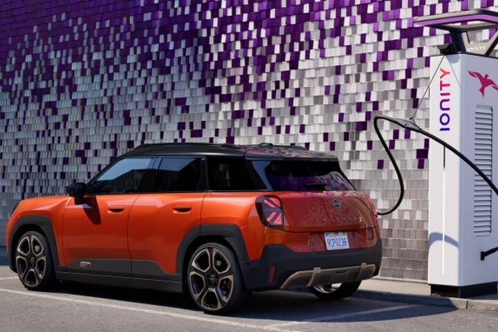 CHARGING AT WORK. image