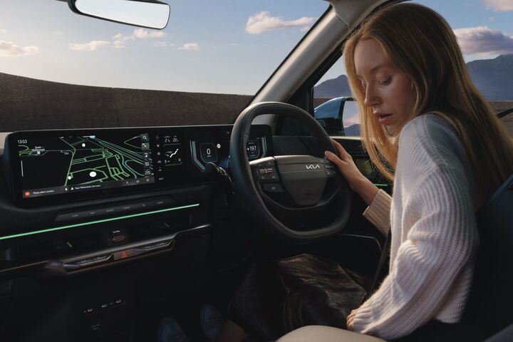 Panoramic triple-display infotainment. image